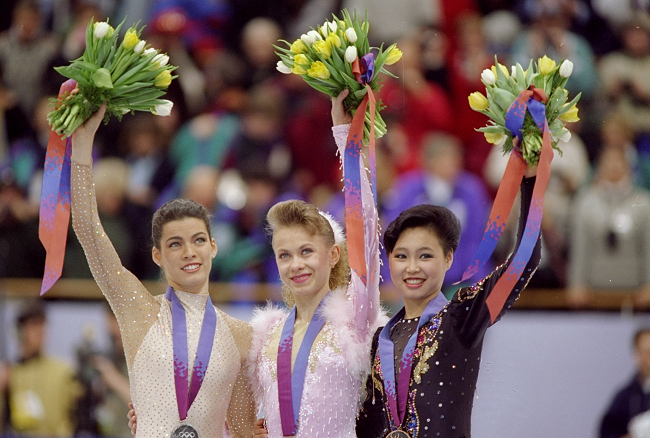 Фігуристки Ненсі Керріган, Оксана Байул і Лу Чен
